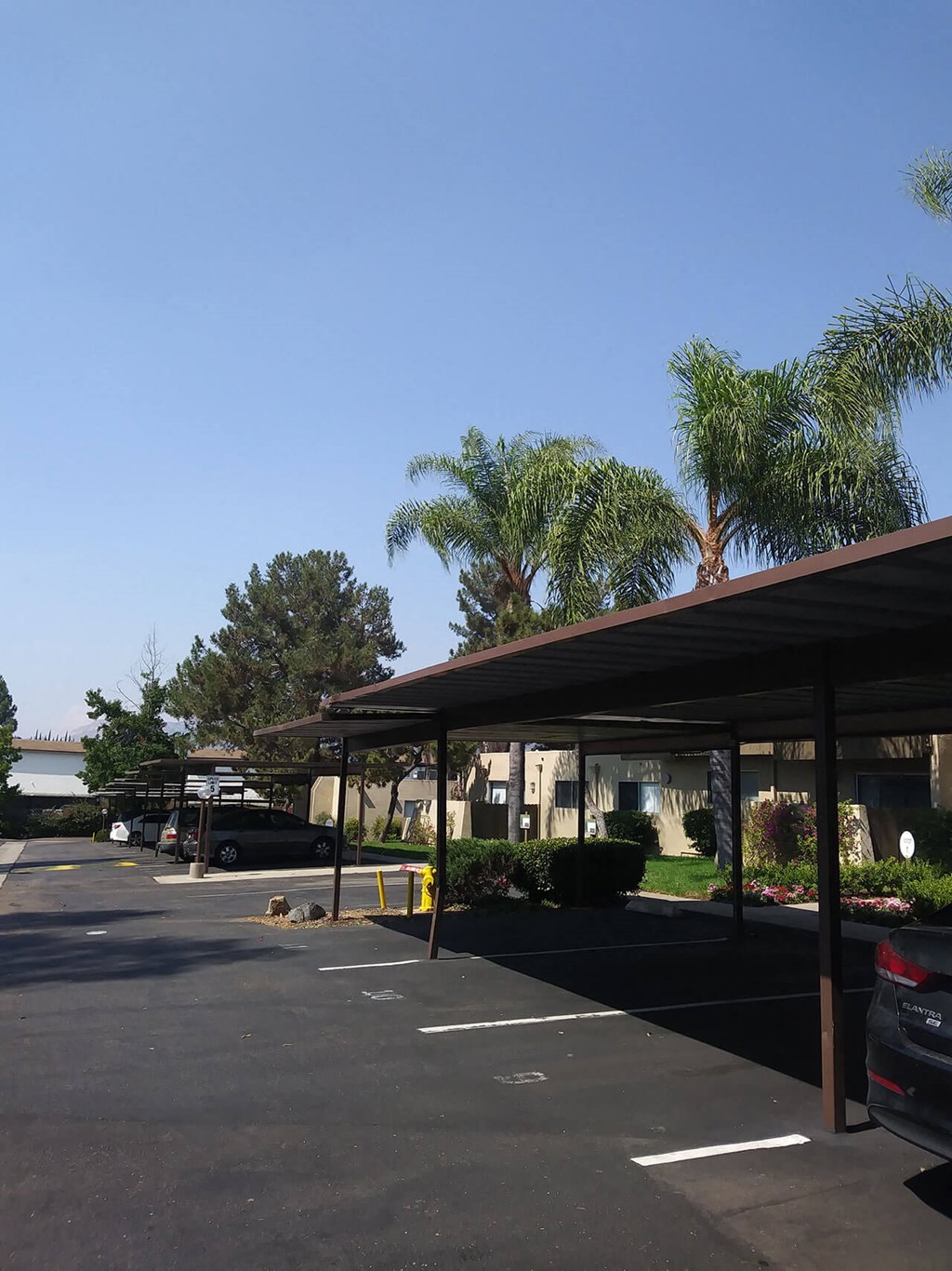 Asigned covered parking at Teton Pines Apartments in Escondido, California.