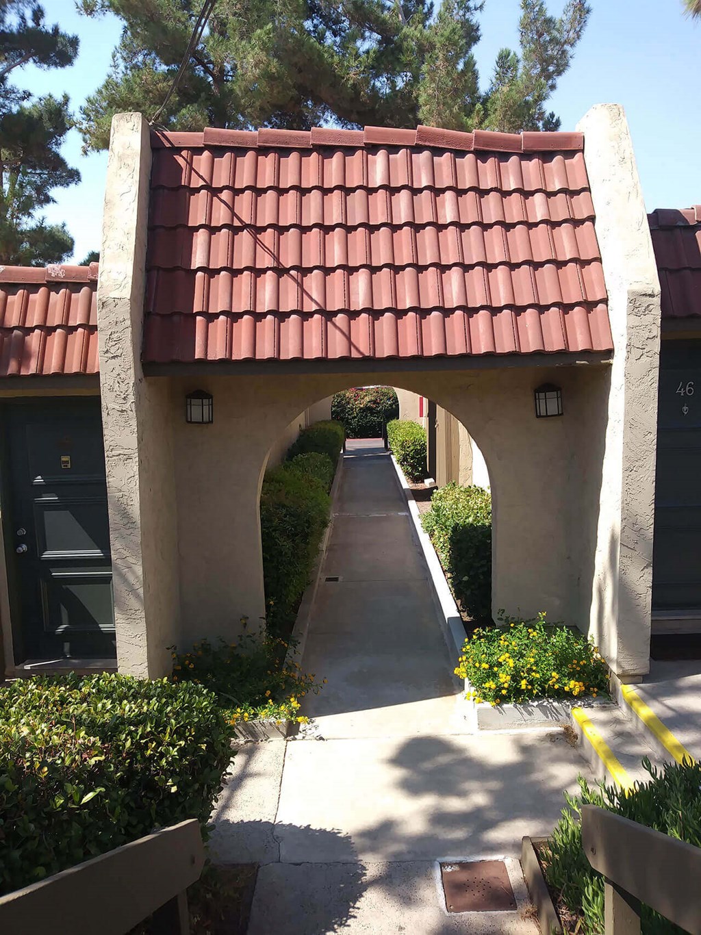 Transition walkway between buidings at Teton Pines Apartments in Escondido, California.