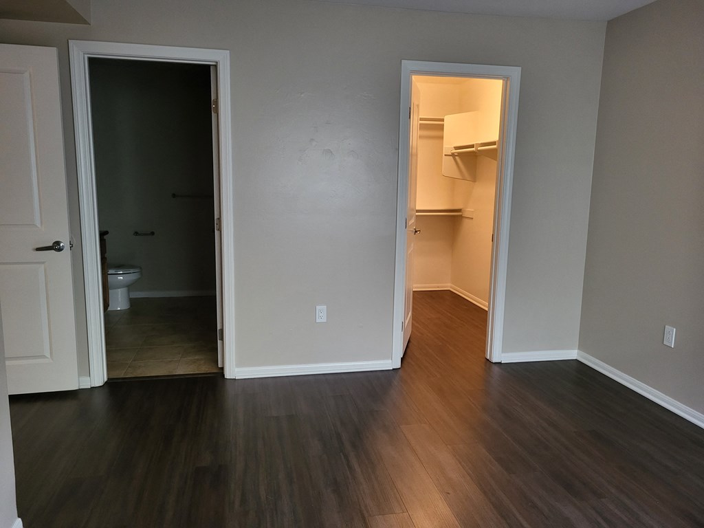 Plank style flooring, large walk-in closets and tile floor bathrooms at The Cove at Bear Valley in Escondido,California.