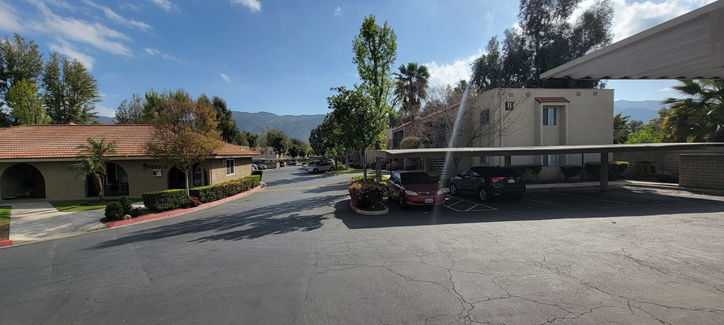 Assigned covered parking and leasing office at Sierra Vista Apartment Homes in Lake Elsinore, California.