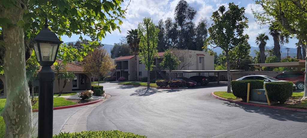 View of the landscaping and mountains at Sierra Vista Apartment Homes in Lake Elsinore, California.