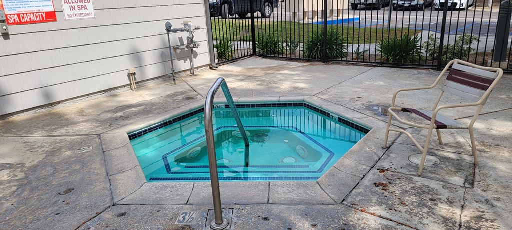Spa in the pool area at Dove Ridge Apartments.