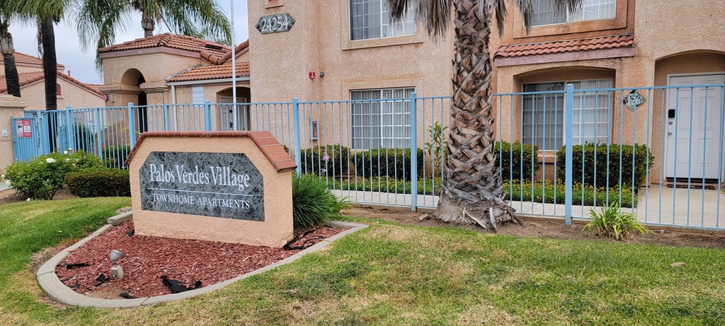 Palos Verdes Village Townhomes entry monument on Dracaea Avenue.