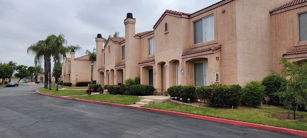 Quiet street of townhomes at Palos Verdes Village in Moreno Valley, CA.