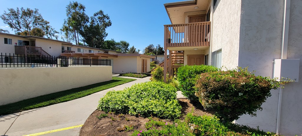 Beautiful landscaping and spa area at Plaza Verde Apartments in Escondido, California.