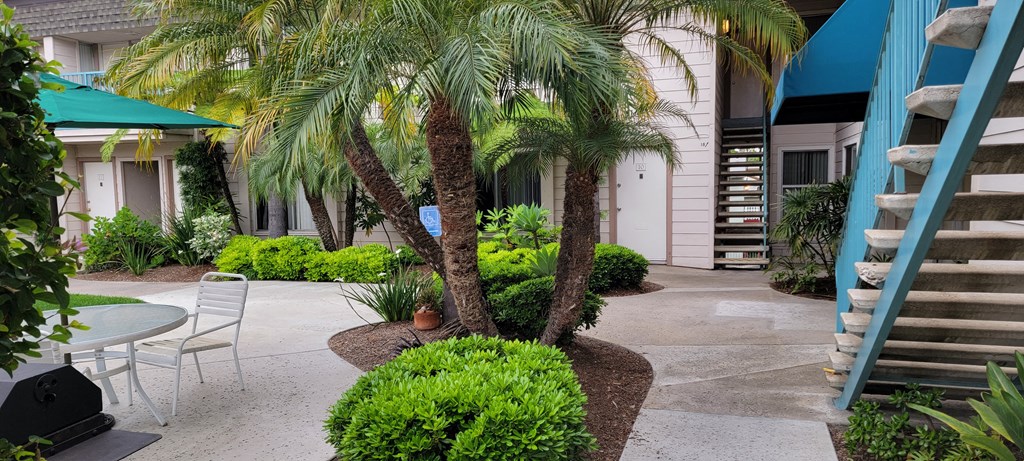 Staircases to second floor apartments at La Mesa Village Apartments in La Mesa, California.