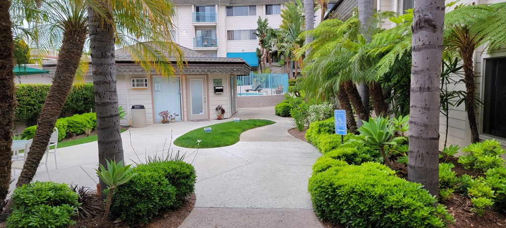 Leasing office and beautiful landscaping at La Mesa Village Apartments in La Mesa, California.