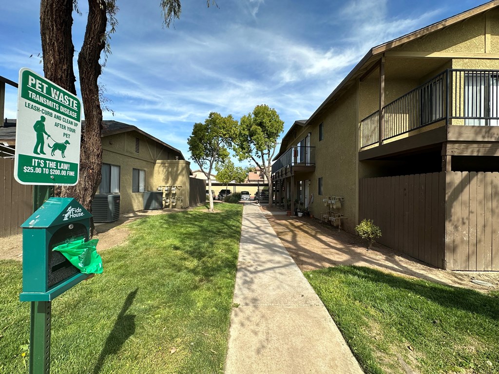 Walkway between buildings at Riverdale Apartment Homes in Hemet, California.