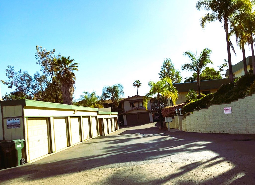 Private garages along enterance to Tulip Street Apartments in Escondido, California.