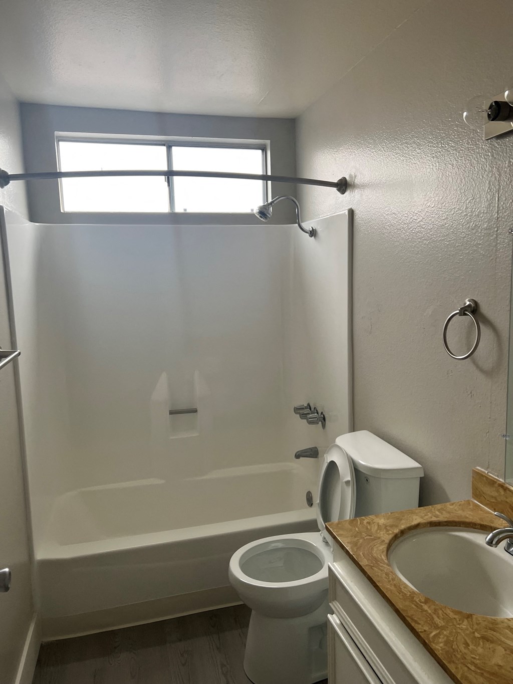 Bathroom with natural lighting at IKARIA Apartments in Santee, California.
