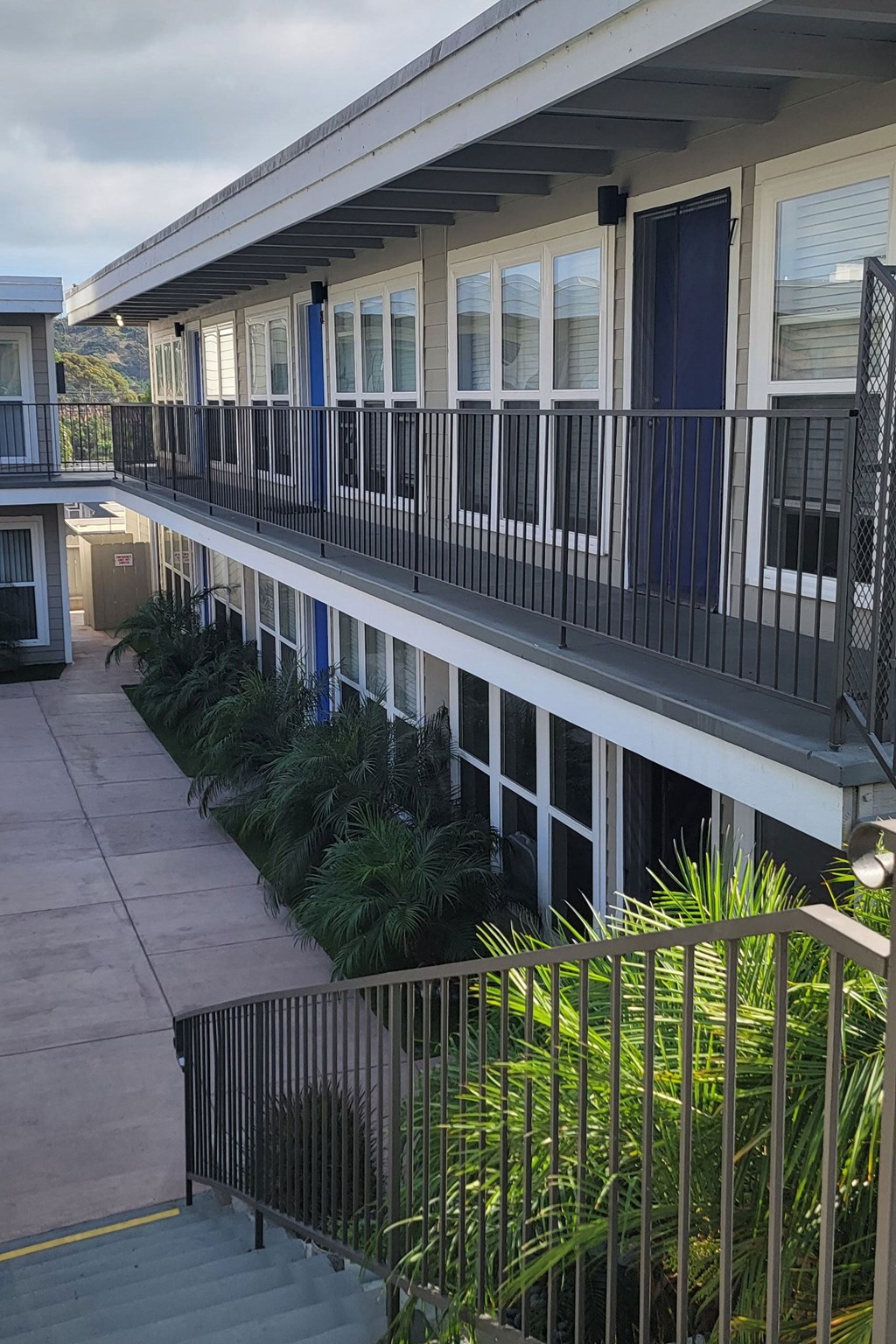 Innear courtyard access to first and second floor apartments at 5747 Lauretta Street Apartments in San Diego, Caliornia.