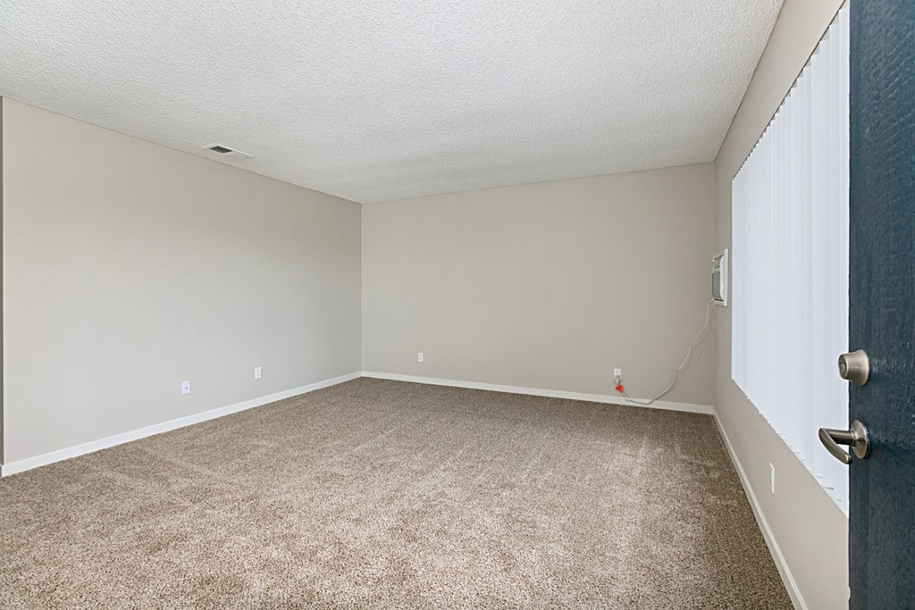 Carpeted Living Room at Solara Apartments in Fallbrook, CA.