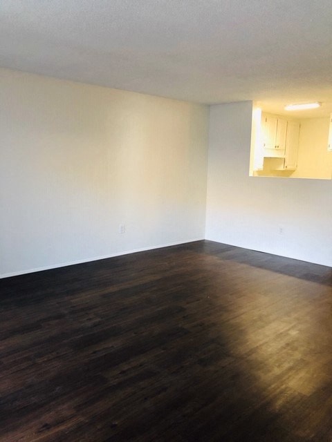 Las Casitas living room with a kitchen in the background