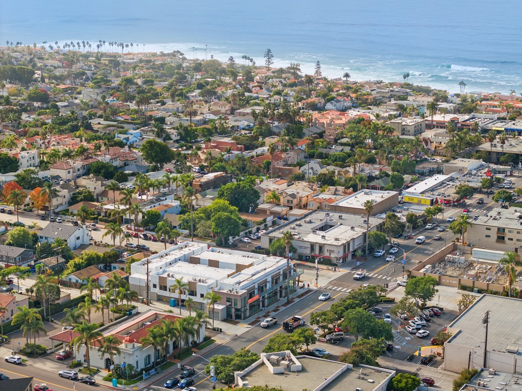 A coastal city with a mix of residential and commercial buildings.