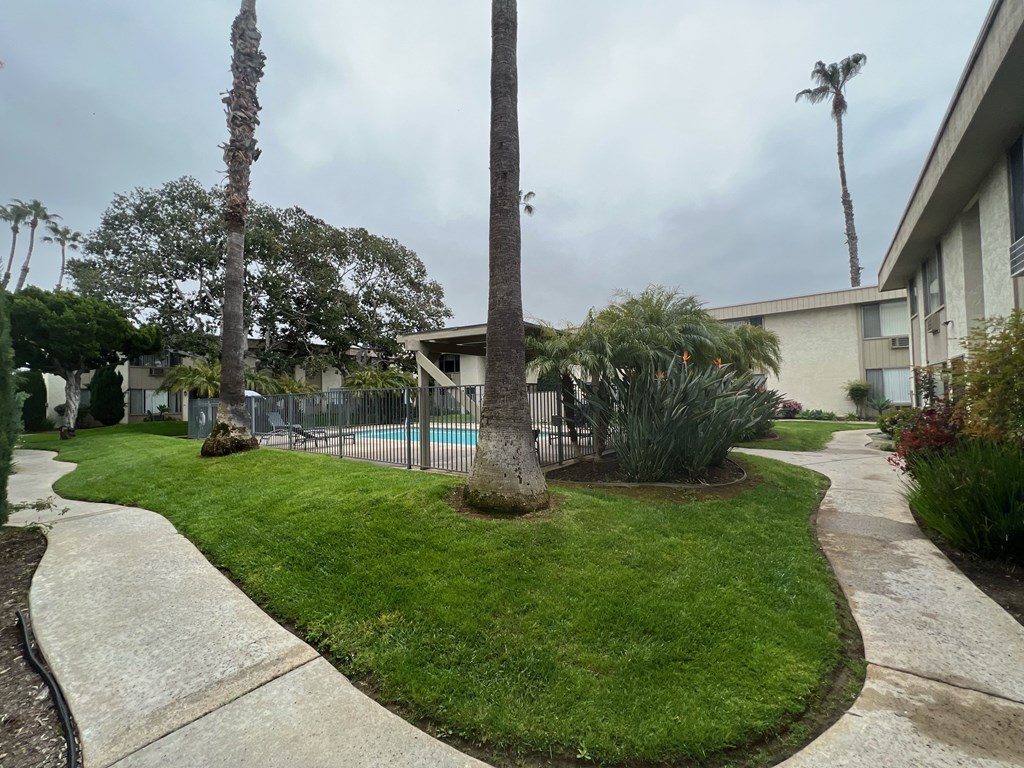 Swimming pool and sun deck at IKARIA Apartments in Santee, California.