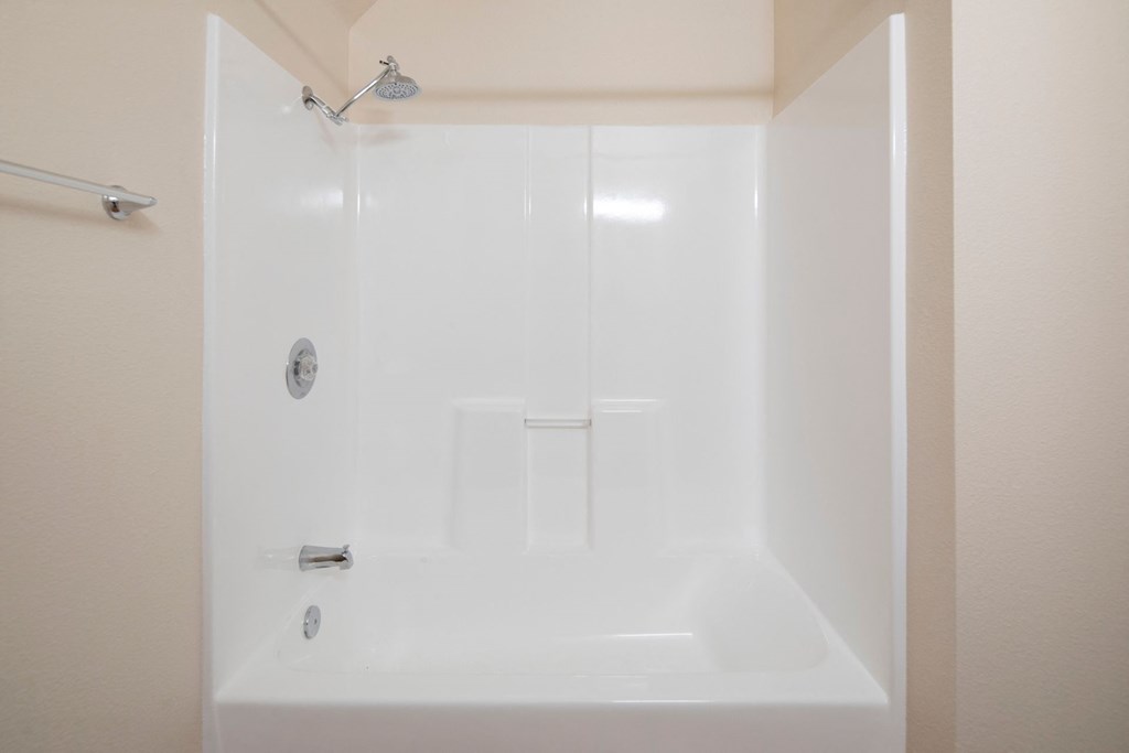 Large bathtub and shower at the Atrium Apartments in San Diego, California.