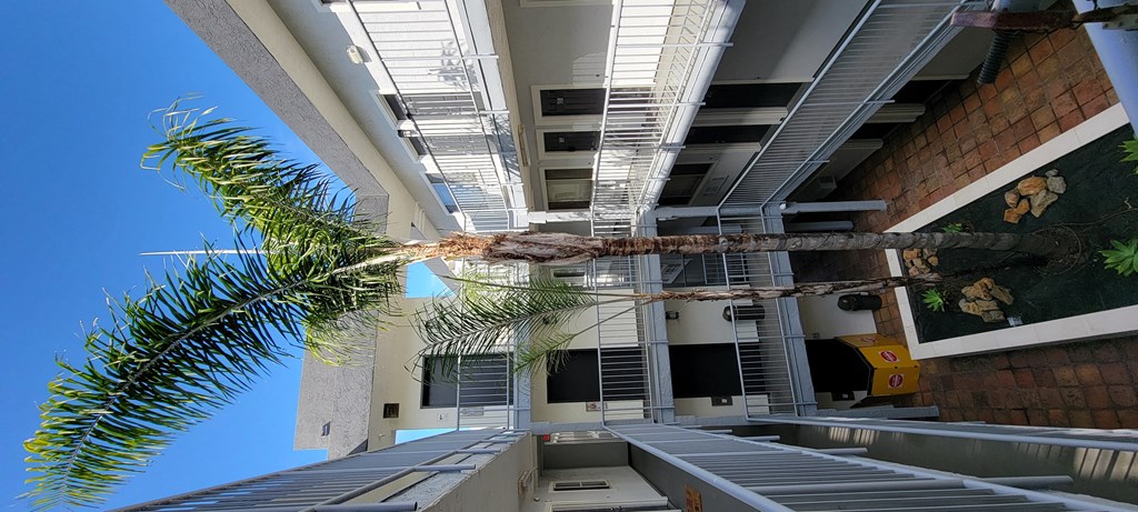 Inner gated courtyard with pleasant ambiance at the Atrium Apartments in downtown San Diego, California.