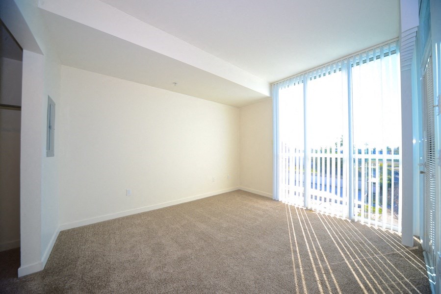 Master bedroom with balcony access and great view at 12th Street Lofts in National City, California.