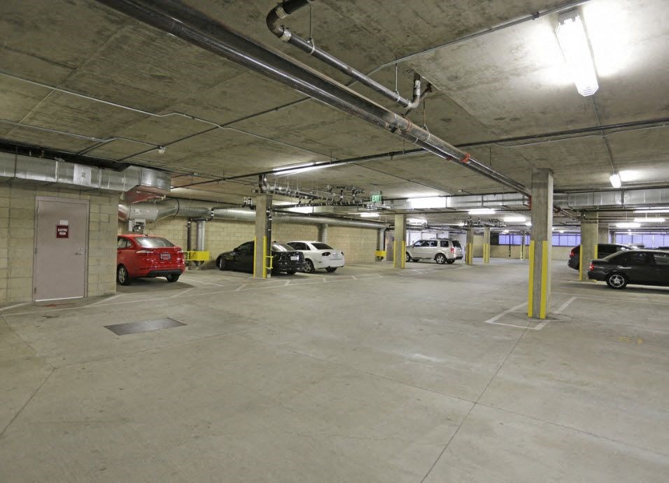 Gated assigned parking at 12th Street Lofts in National City, California.