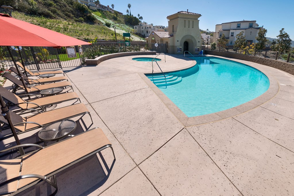 Swimming pool and spa at Costa Pointe Luxury Townhomes in the La Costa area of Carlsbad, California.