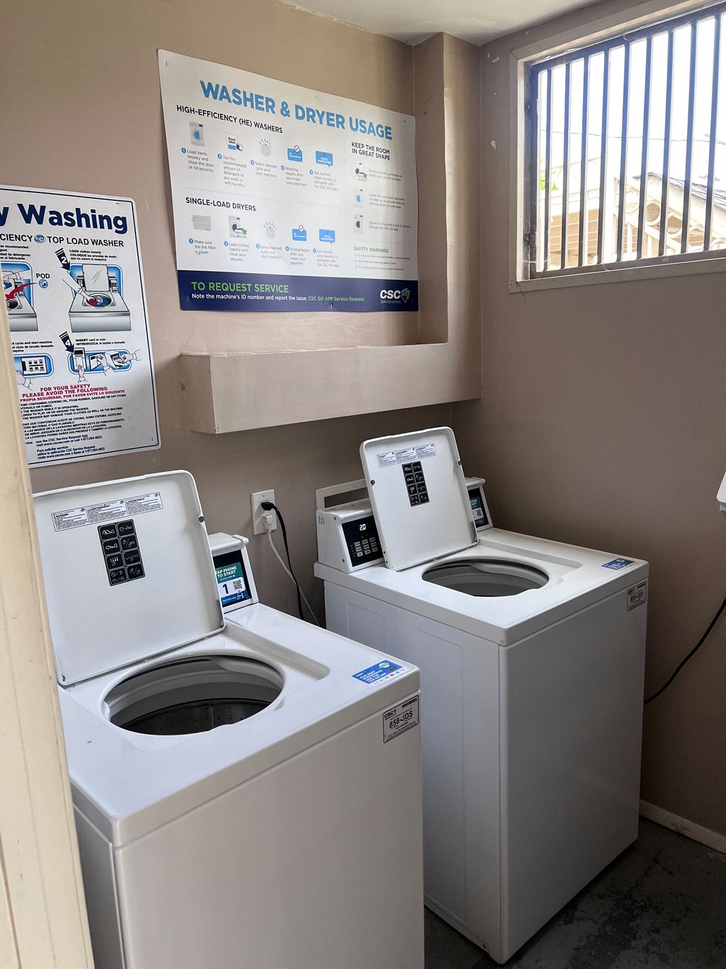 Laundry room at Dubuque Apartments.