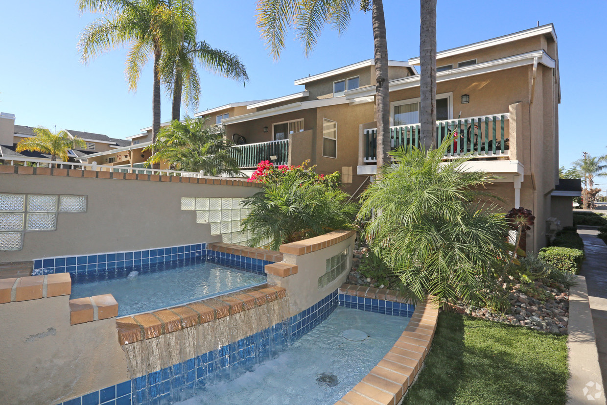 Display of multi-level waterfall at property entrance