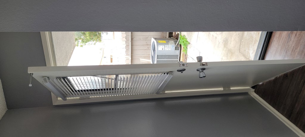 Kitchen back door to private patio at Grand Oaks Apartments in Lake Elsinore, California.