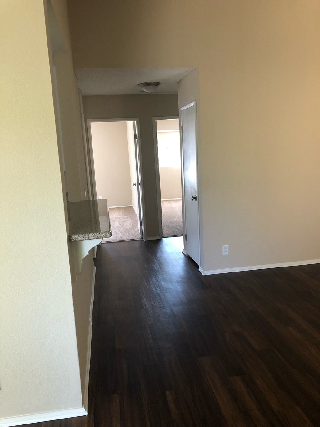 View down hallway from living room entry at Grande Vista Apartments.