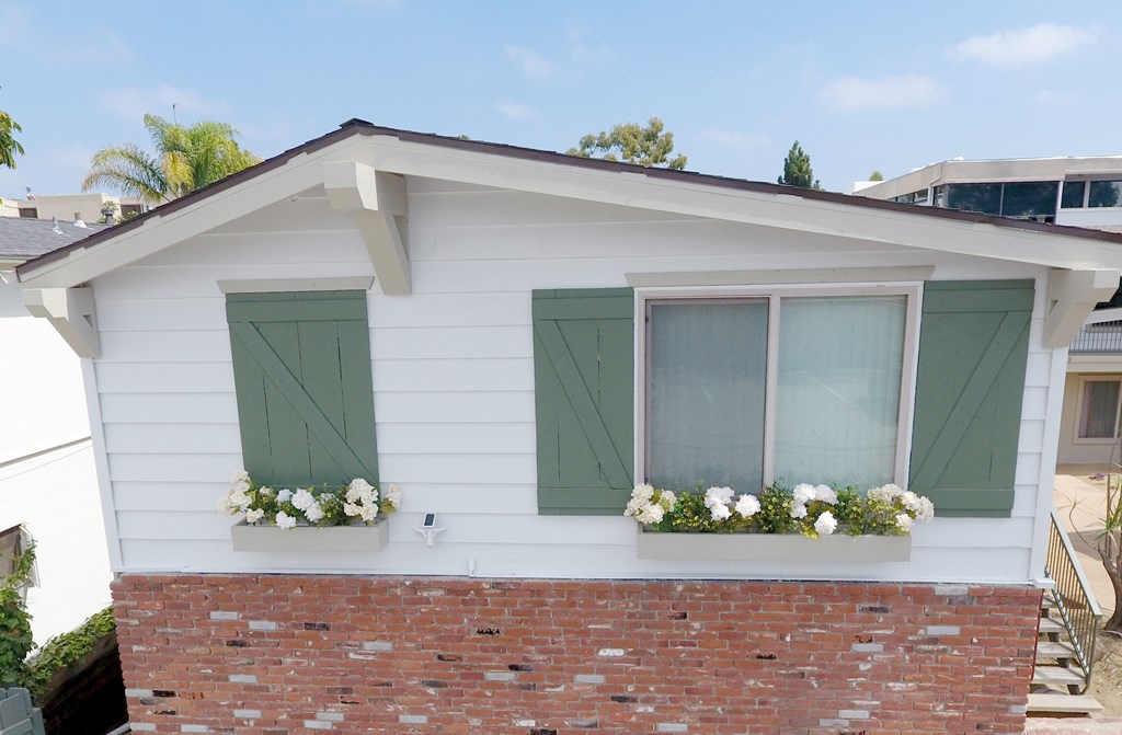 Quaint harbor style and look at Harbor Villa Apartments in San Diego, California.