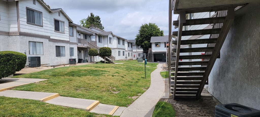 Walkways between buildings at Grand Oaks Apartments in Lake Elsinore, California.