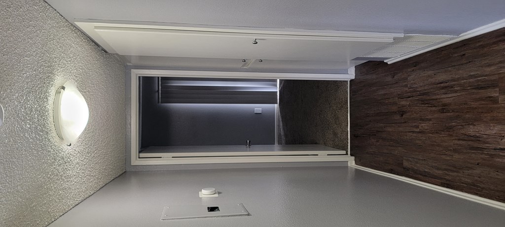 Bedroom hallway with lots of closet space at Grand Oaks Apartments in Lake Elsinore, California.