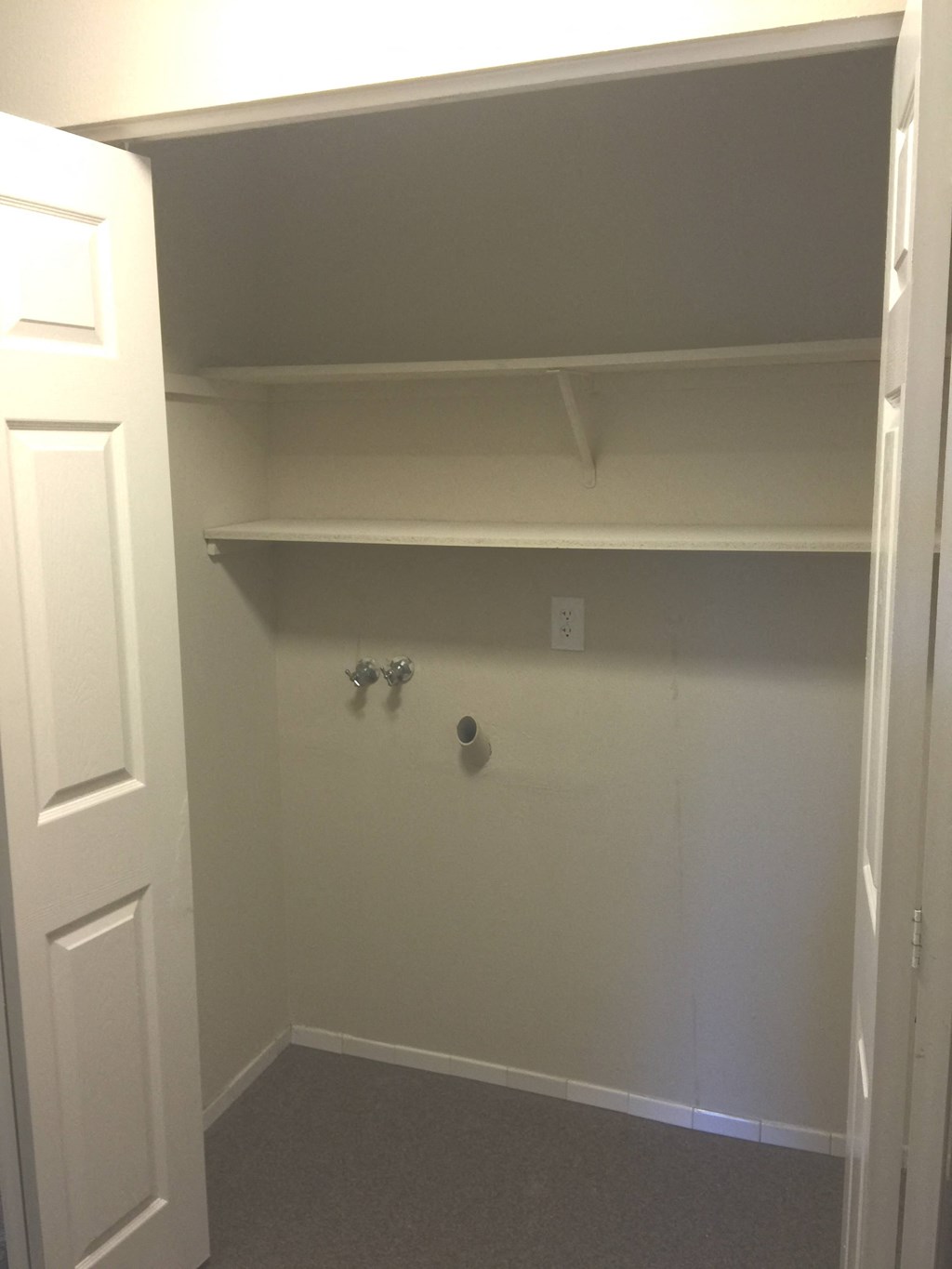 Washer dryer hookups at La Costa 15 Apartments in La Costa, CA.