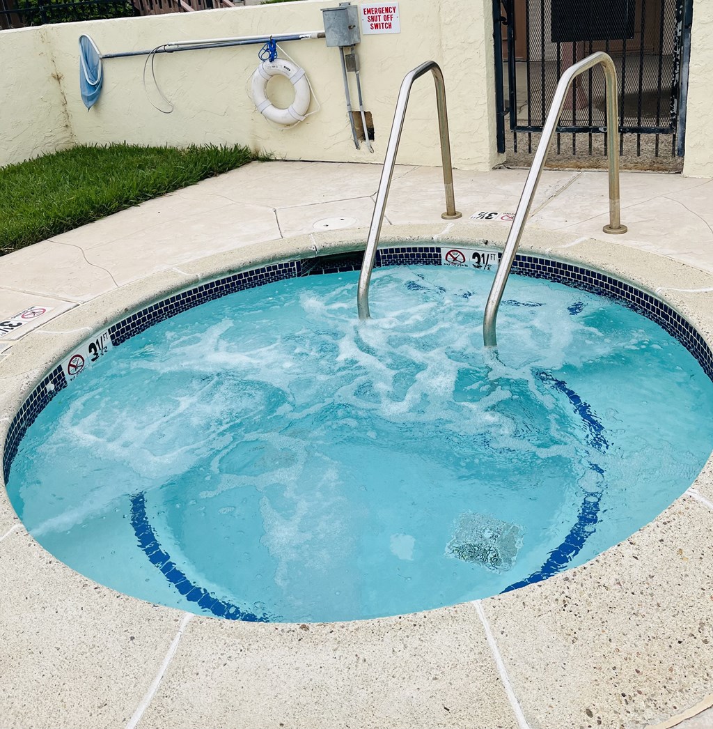 Inviting clear spa in private area at Plaza Verde Apartments in Escondido, California.