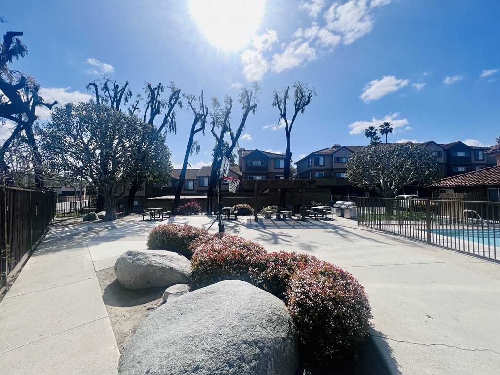 BBQ picnic and play area at Grande Vista Apartments.