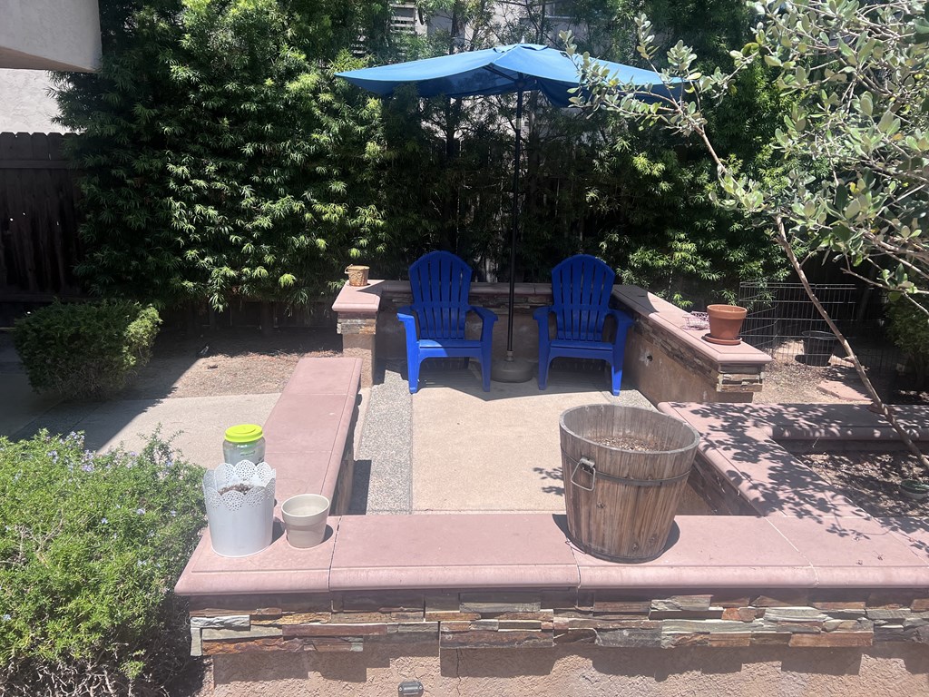 Peaceful shaded patio at Herman Avenue Apartments in the North Park area of San Diego, California.