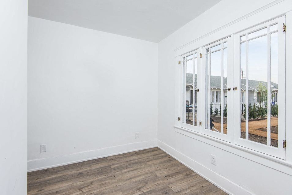 Bedroom with great windows at 4141 Normal Avenue in Los Angeles, California.