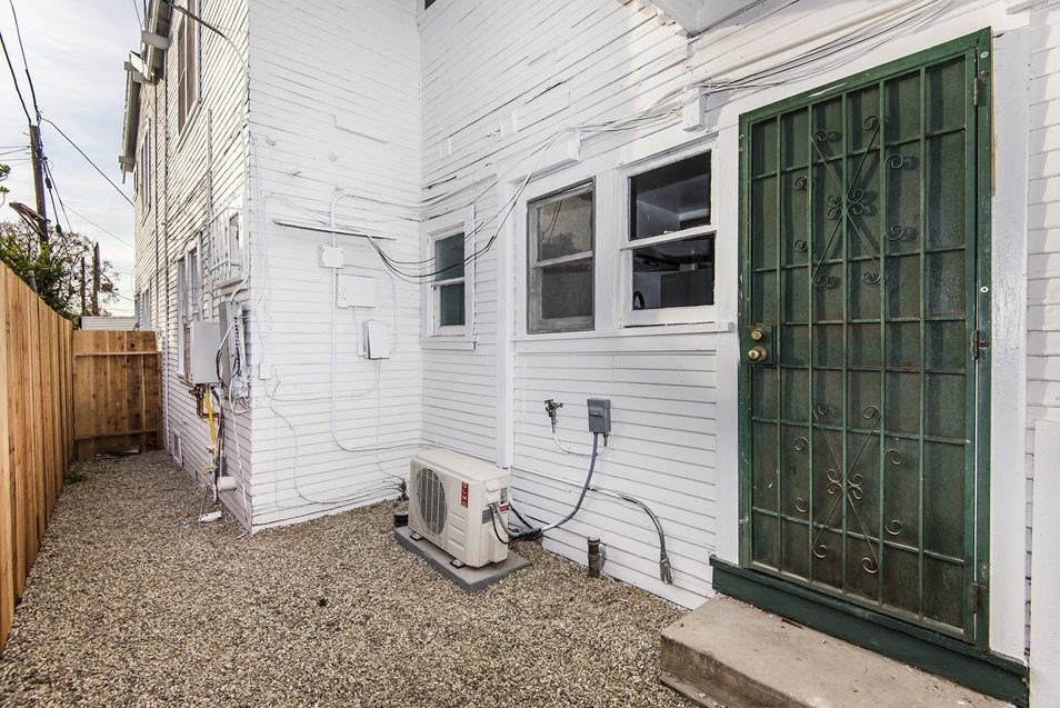 Fenced area behind apartment home at 4141 Normal Avenue in Los Angeles, California.