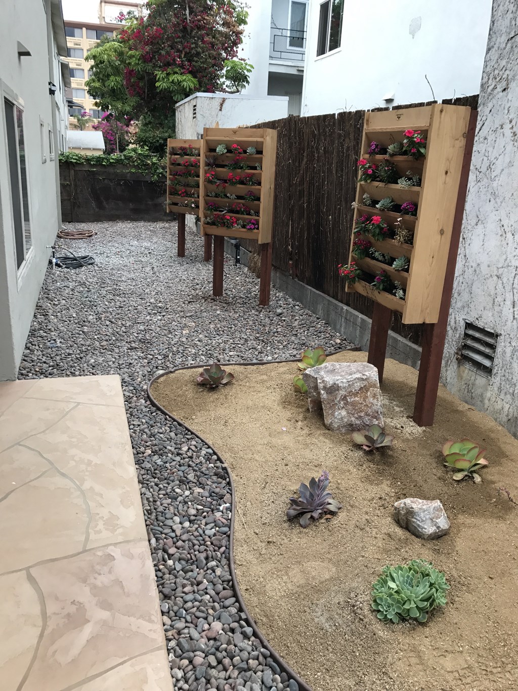 Community garden area at Harbor Villa Apartments in San Diego, California.