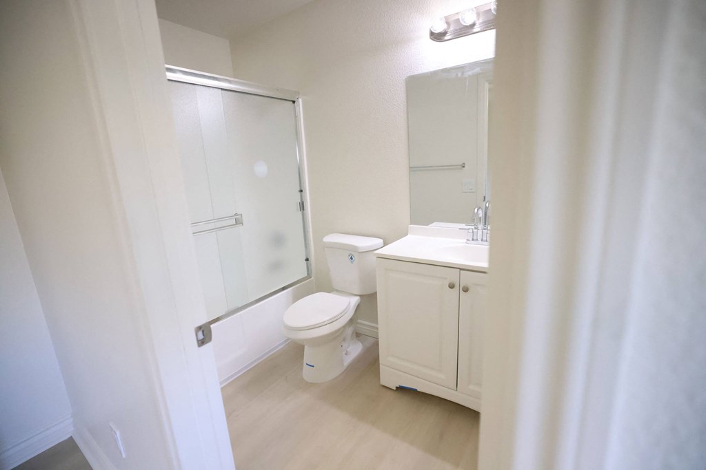 Full private bathroom in first large bedroom at Lone Pine Townhomes.