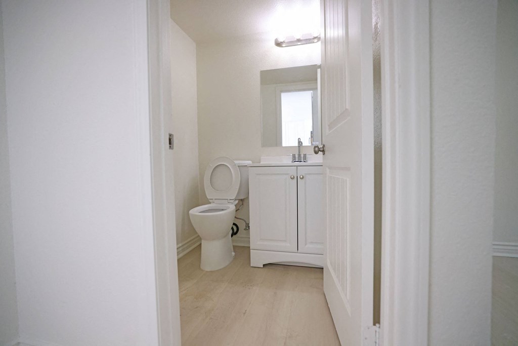 Downstairs half-bath at Lone Pine Townhomes in El Cajon, California.