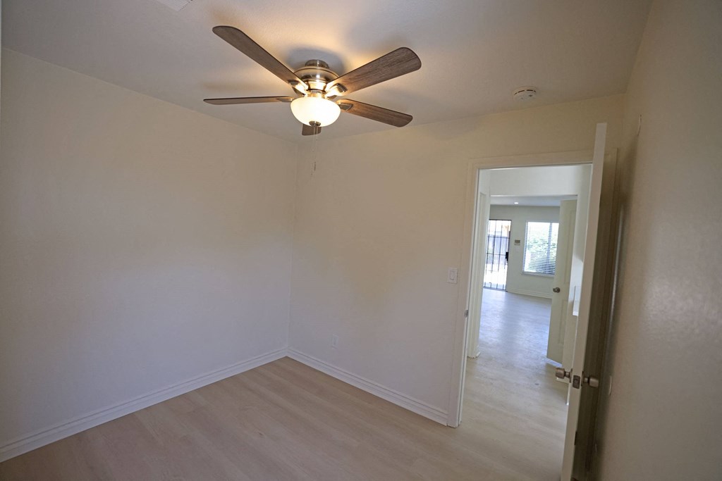 Bonus room next to kitchen with hard wood floors and large closet at Lone Pine Townhomes.