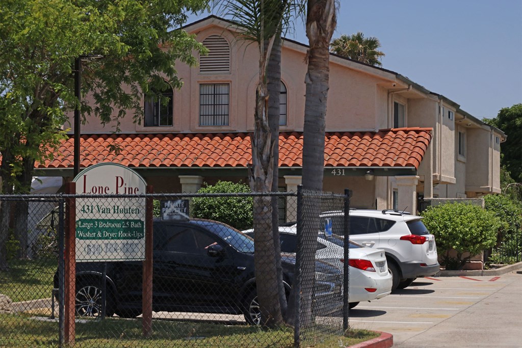 Street view of Lone Pine Townhomes in El Cajon, California.