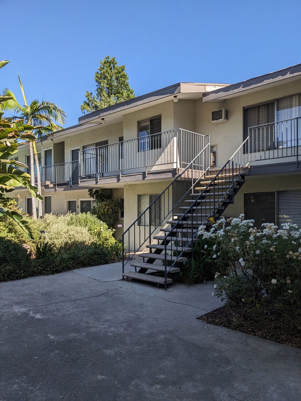 Innear courtyard stairway to second floor apartments at Los Robles in Pasadena, California.