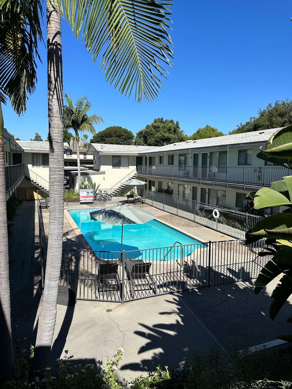 View of swimming pool from second floor level of Los Robles Apartments in Pasadena, California.