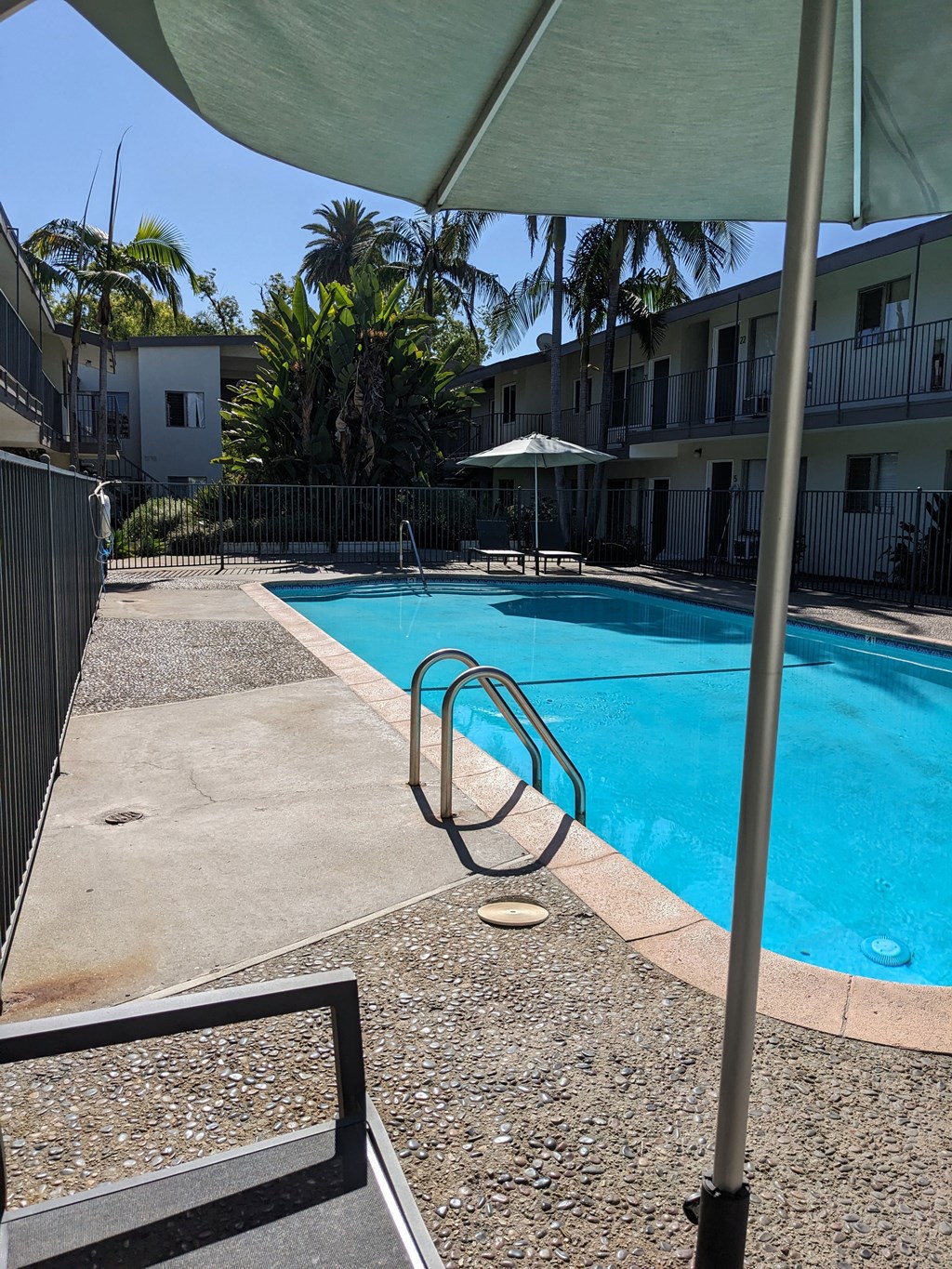 Swimming pool in center courtyard at Los Robles Apartments in Pasadena, California.