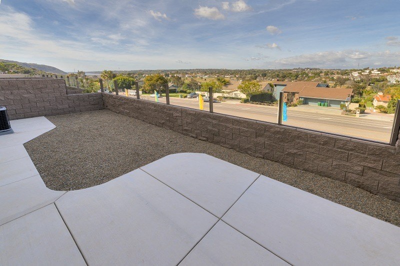 Neptuen unit backyard view at Costa Pointe Luxury Townhomes in Carlsbad, California.