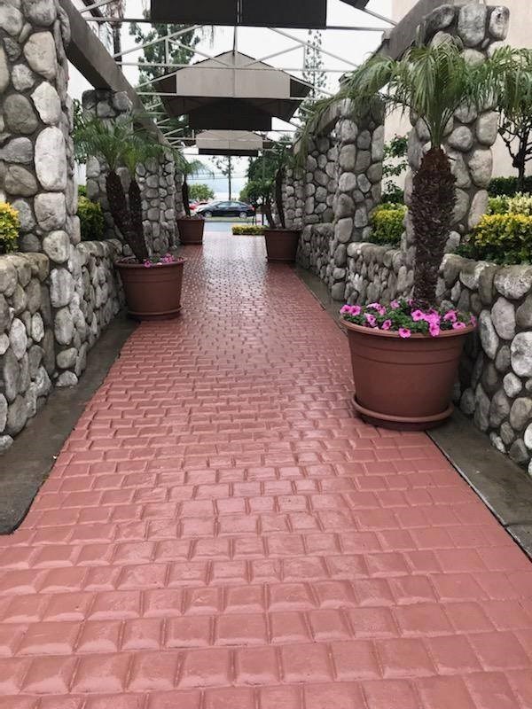 Elegant resort style enterance to Northwood Apartments in Upland, California.