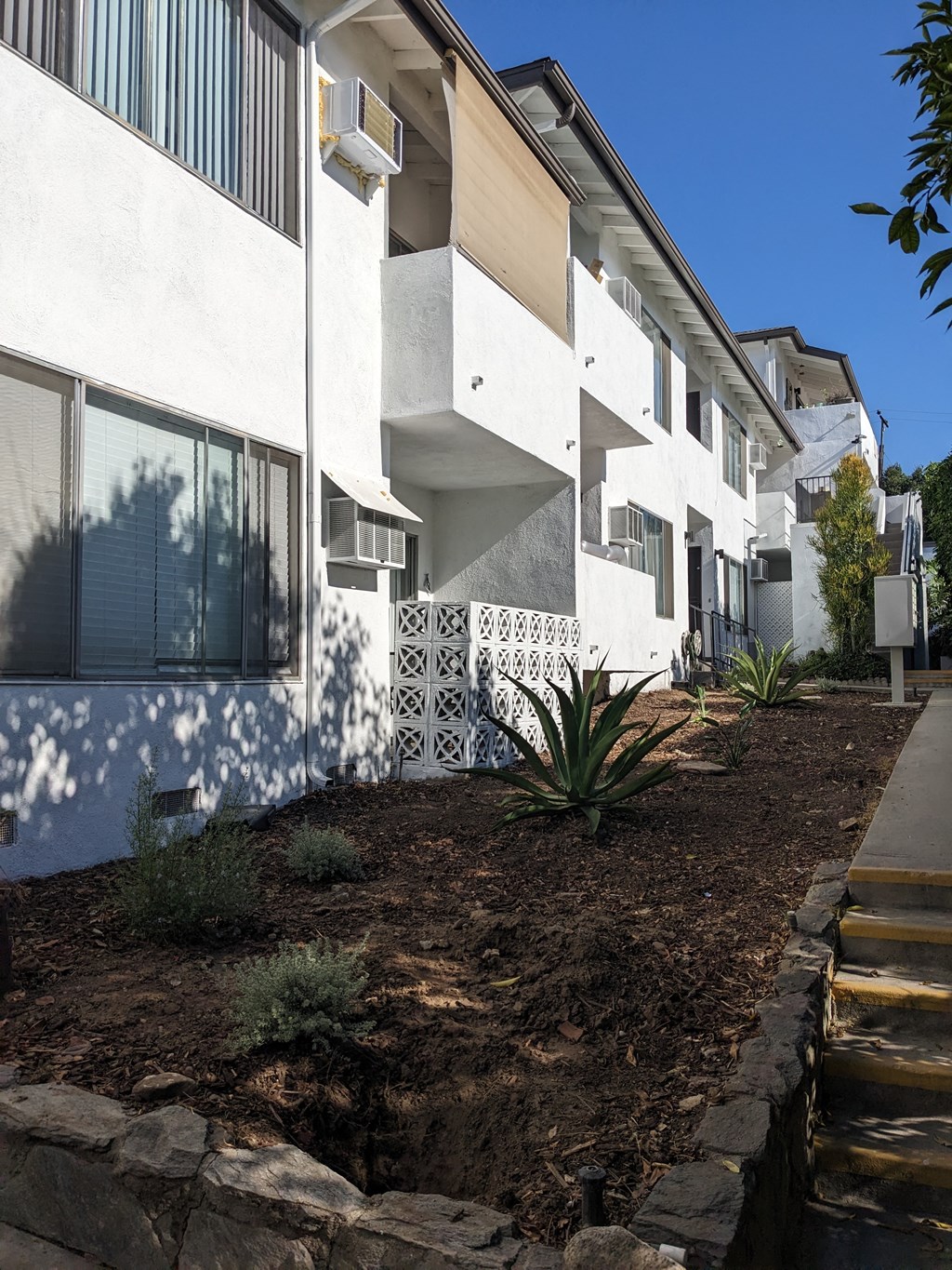 Exterior walkway at The Hardison Apartments in Pasadena, California.