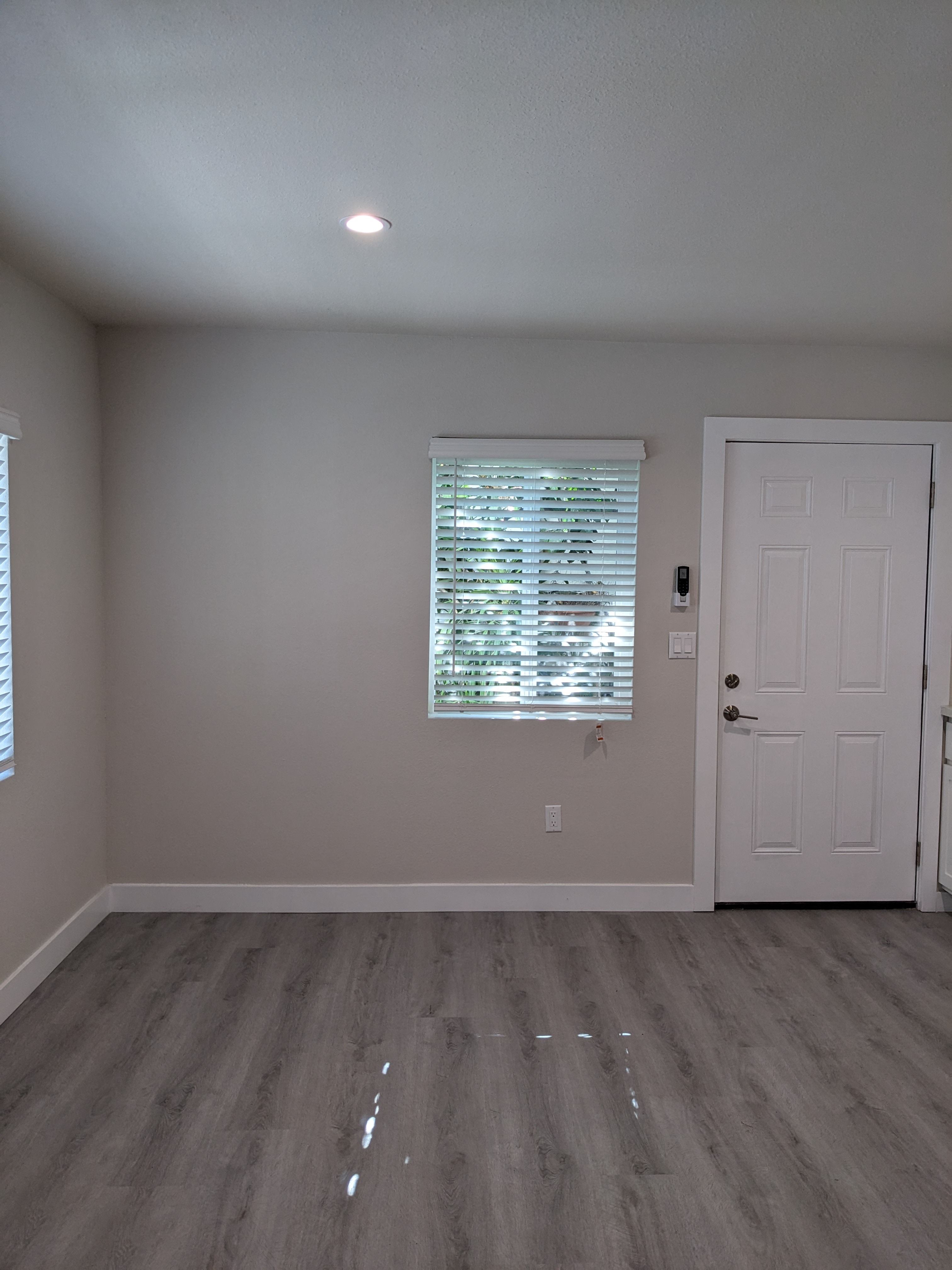 Large eating space with lots of natural lighting in kitchen at The Hardison Apartments in Pasadena, California.