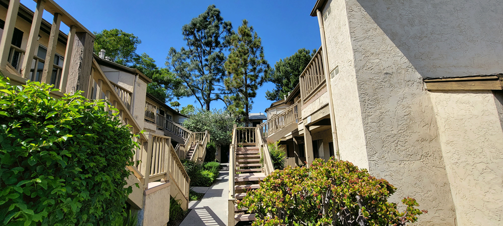 Mature landscaping at Sierra Heights Apartments.